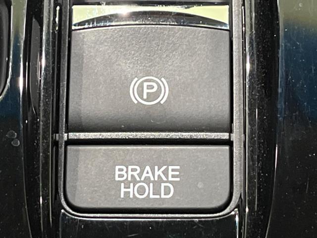 ステップワゴンスパーダ スパーダハイブリッド G ホンダセンシング 両側電動ドア 後席モニター 純正9型ナビ 全周囲カメラ アダプティブクルーズ 禁煙車 ドラレコ ETC スマートキー LEDヘッド 車線逸脱警報 誤発信抑制機能 先行車発進告知 CD DVD再生(38枚目)