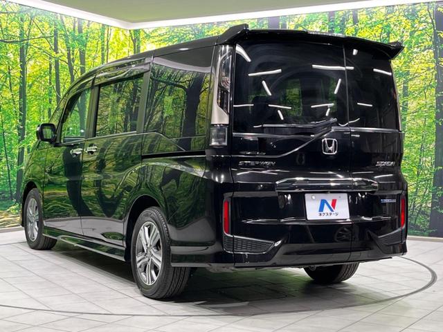 ステップワゴンスパーダ スパーダハイブリッド G ホンダセンシング 両側電動ドア 後席モニター 純正9型ナビ 全周囲カメラ アダプティブクルーズ 禁煙車 ドラレコ ETC スマートキー LEDヘッド 車線逸脱警報 誤発信抑制機能 先行車発進告知 CD DVD再生(67枚目)