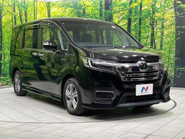 ステップワゴンスパーダ スパーダハイブリッド G ホンダセンシング 両側電動ドア 後席モニター 純正9型ナビ 全周囲カメラ アダプティブクルーズ 禁煙車 ドラレコ ETC スマートキー LEDヘッド 車線逸脱警報 誤発信抑制機能 先行車発進告知 CD DVD再生(68枚目)