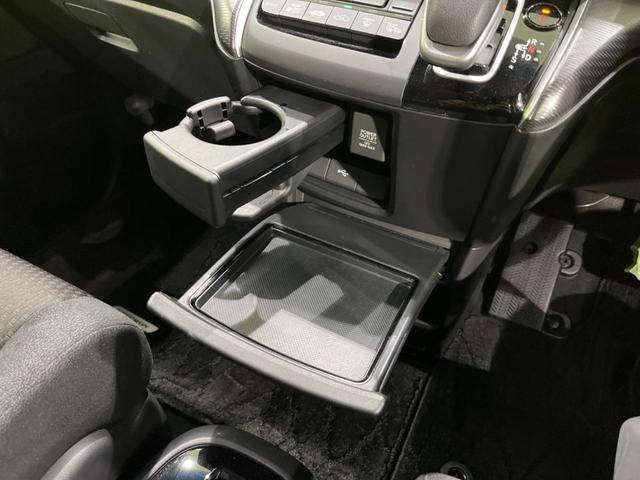 ステップワゴンスパーダ スパーダハイブリッド G ホンダセンシング 両側電動ドア 後席モニター 純正9型ナビ 全周囲カメラ アダプティブクルーズ 禁煙車 ドラレコ ETC スマートキー LEDヘッド 車線逸脱警報 誤発信抑制機能 先行車発進告知 CD DVD再生(76枚目)