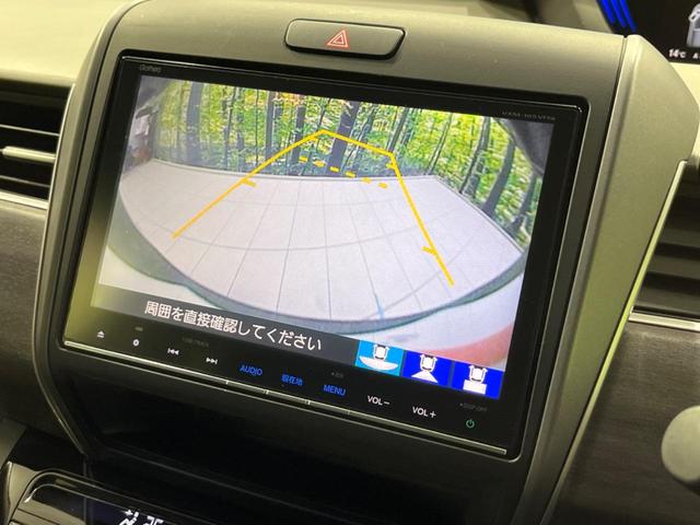 フリード＋ハイブリッド ハイブリッドＥＸ　両側電動ドア　純正９型ナビ　後席モニター　バックカメラ　衝突軽減装置　レーダークルーズ　禁煙車　ハーフレザーシート　シートヒーター　ドラレコ　スマートキー　ＬＥＤヘッド　ＥＴＣ　オートハイビーム（5枚目）