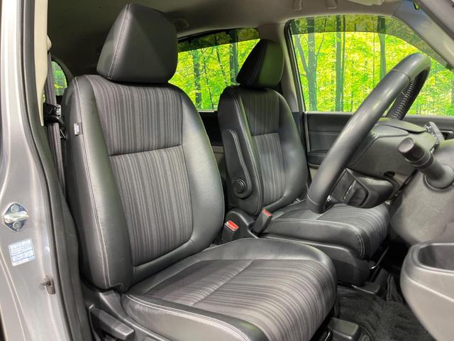 フリード＋ハイブリッド ハイブリッドＥＸ　両側電動ドア　純正９型ナビ　後席モニター　バックカメラ　衝突軽減装置　レーダークルーズ　禁煙車　ハーフレザーシート　シートヒーター　ドラレコ　スマートキー　ＬＥＤヘッド　ＥＴＣ　オートハイビーム（8枚目）