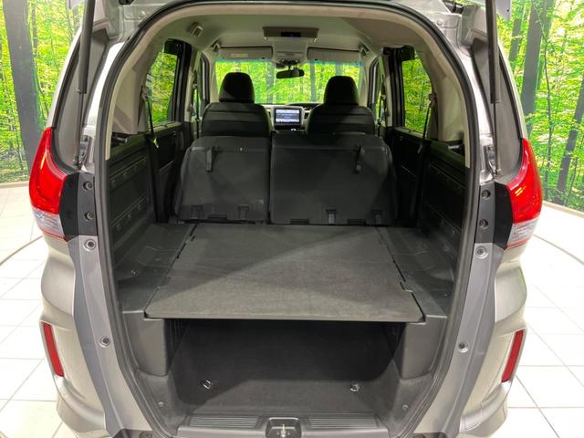 フリード＋ハイブリッド ハイブリッドＥＸ　両側電動ドア　純正９型ナビ　後席モニター　バックカメラ　衝突軽減装置　レーダークルーズ　禁煙車　ハーフレザーシート　シートヒーター　ドラレコ　スマートキー　ＬＥＤヘッド　ＥＴＣ　オートハイビーム（10枚目）