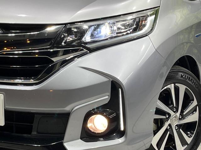 フリード＋ハイブリッド ハイブリッドＥＸ　両側電動ドア　純正９型ナビ　後席モニター　バックカメラ　衝突軽減装置　レーダークルーズ　禁煙車　ハーフレザーシート　シートヒーター　ドラレコ　スマートキー　ＬＥＤヘッド　ＥＴＣ　オートハイビーム（12枚目）