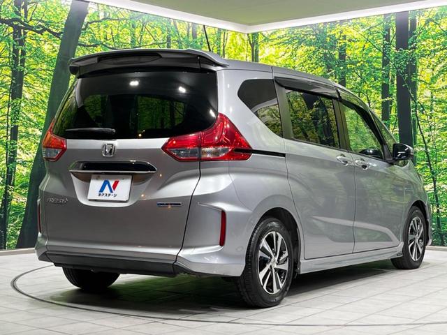 フリード＋ハイブリッド ハイブリッドＥＸ　両側電動ドア　純正９型ナビ　後席モニター　バックカメラ　衝突軽減装置　レーダークルーズ　禁煙車　ハーフレザーシート　シートヒーター　ドラレコ　スマートキー　ＬＥＤヘッド　ＥＴＣ　オートハイビーム（17枚目）