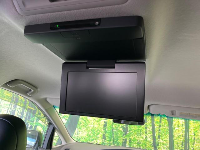 エスティマ アエラス　プレミアムエディション　４ＷＤ　両側電動ドア　純正ナビ　後席モニター　全周囲カメラ　禁煙車　ハーフレザーシート　パワーシート　スマートキー　ＨＩＤヘッド　ＥＴＣ　クルコン　オートライト　デュアルオートエアコン　オットマン（3枚目）