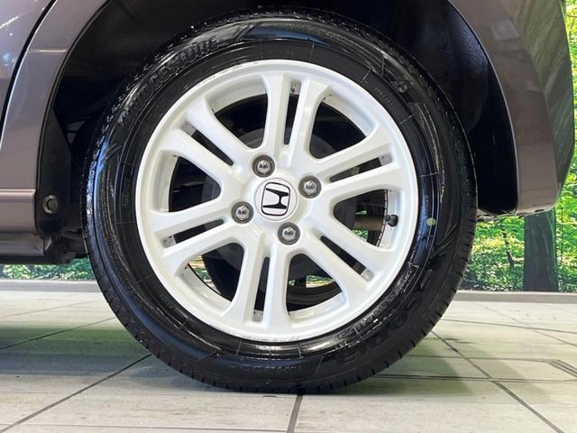 Ｎ－ＢＯＸ ２トーンカラースタイル　ＧターボＳＳパッケージ　両側電動ドア　純正ナビ　バックカメラ　衝突軽減装置　禁煙車　スマートキー　ＨＩＤヘッド　ＥＴＣ　クルコン　パドルシフト　純正１４インチＡＷ　オートライト　オートエアコン　Ｂｌｕｅｔｏｏｔｈ　ＤＶＤ再生（28枚目）