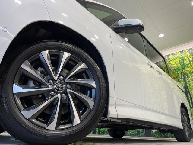 ヴォクシー ハイブリッドＳ－Ｚ　両側電動ドア　後席モニター　純正１０．５型ナビ　全周囲カメラ　衝突軽減装置　レーダークルーズ　禁煙車　電動リアゲート　ハーフレザーシート　コーナーセンサー　スマートキー　ＬＥＤヘッド　ＥＴＣ　フルセグ（14枚目）