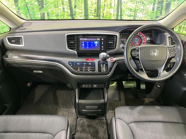 オデッセイ アブソルート　両側電動ドア　純正ナビ　バックカメラ　衝突軽減装置　禁煙車　ハーフレザーシート　スマートキー　ＬＥＤヘッド＆フォグ　ＥＴＣ　クルコン　オートライト　オートエアコン　純正１７インチＡＷ　革巻きハンドル（2枚目）