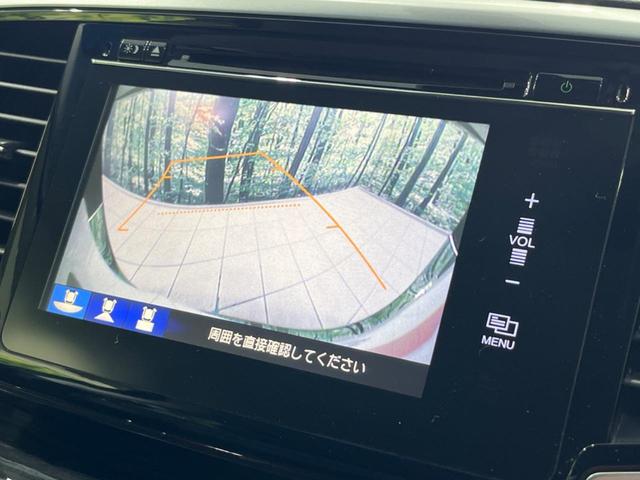 オデッセイ アブソルート　両側電動ドア　純正ナビ　バックカメラ　衝突軽減装置　禁煙車　ハーフレザーシート　スマートキー　ＬＥＤヘッド＆フォグ　ＥＴＣ　クルコン　オートライト　オートエアコン　純正１７インチＡＷ　革巻きハンドル（5枚目）