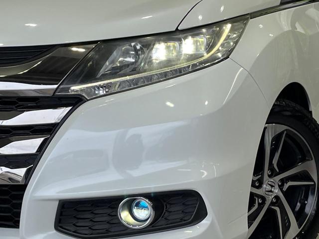 オデッセイ アブソルート　両側電動ドア　純正ナビ　バックカメラ　衝突軽減装置　禁煙車　ハーフレザーシート　スマートキー　ＬＥＤヘッド＆フォグ　ＥＴＣ　クルコン　オートライト　オートエアコン　純正１７インチＡＷ　革巻きハンドル（13枚目）