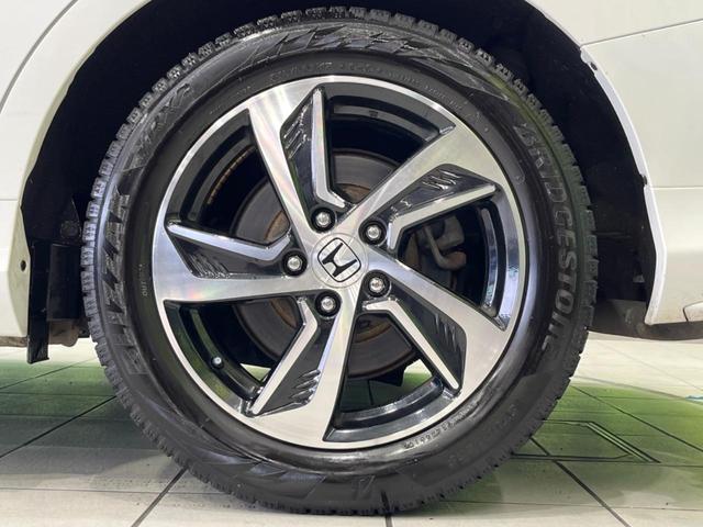 オデッセイ アブソルート　両側電動ドア　純正ナビ　バックカメラ　衝突軽減装置　禁煙車　ハーフレザーシート　スマートキー　ＬＥＤヘッド＆フォグ　ＥＴＣ　クルコン　オートライト　オートエアコン　純正１７インチＡＷ　革巻きハンドル（58枚目）