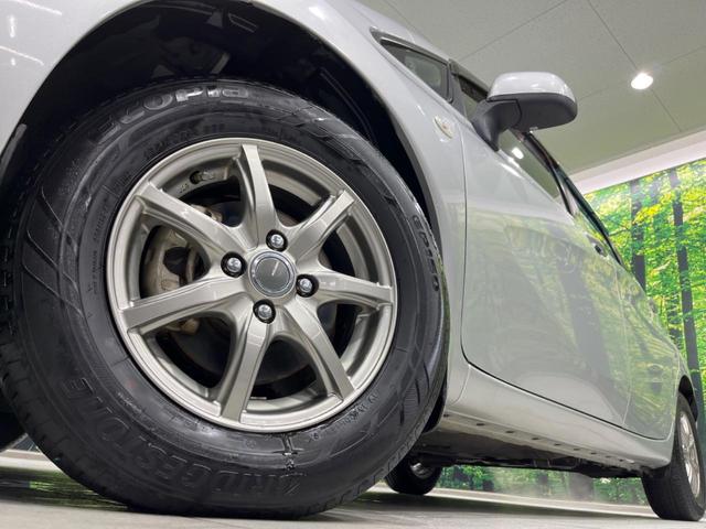 ノート Ｘ　ＤＩＧ－Ｓ　禁煙車　スマートキー　オートエアコン　ＣＤ再生　ＡＵＸ　ＡＭ／ＦＭラジオ機能　アイドリングストップ　電動格納ミラー　ヘッドライトレベライザー　シートリフター　盗難防止装置　プライバシーガラス（13枚目）