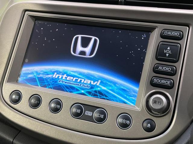 フィットハイブリッド ハイブリッド・10thアニバーサリー 純正ナビ バックカメラ 禁煙車 ドラレコ スマートキー HIDヘッド ETC クルコン オートライト オートエアコン CD DVD再生 地デジ ステアリングスイッチ アイドリングストップ(3枚目)