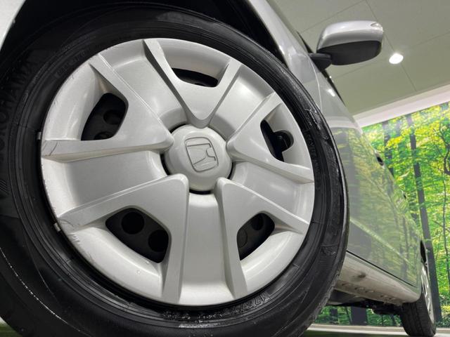 フィットハイブリッド ハイブリッド・10thアニバーサリー 純正ナビ バックカメラ 禁煙車 ドラレコ スマートキー HIDヘッド ETC クルコン オートライト オートエアコン CD DVD再生 地デジ ステアリングスイッチ アイドリングストップ(17枚目)