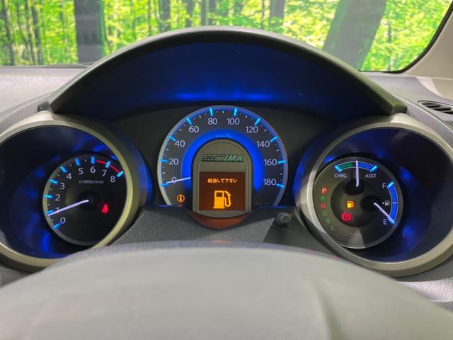 フィットハイブリッド ハイブリッド・10thアニバーサリー 純正ナビ バックカメラ 禁煙車 ドラレコ スマートキー HIDヘッド ETC クルコン オートライト オートエアコン CD DVD再生 地デジ ステアリングスイッチ アイドリングストップ(30枚目)