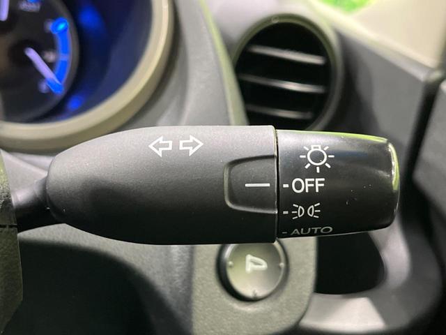 フィットハイブリッド ハイブリッド・10thアニバーサリー 純正ナビ バックカメラ 禁煙車 ドラレコ スマートキー HIDヘッド ETC クルコン オートライト オートエアコン CD DVD再生 地デジ ステアリングスイッチ アイドリングストップ(31枚目)