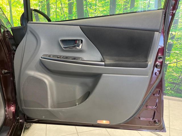 プリウスアルファ S チューン ブラック 純正ナビ バックカメラ 禁煙車 スマートキー ETC 純正16インチAW オートライト オートエアコン Bluetooth再生 CD DVD再生 フルセグ 革巻きハンドル ステアリングスイッチ(55枚目)