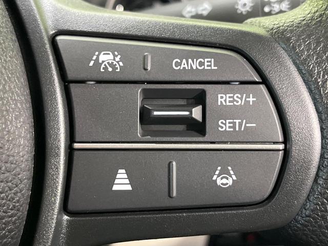 N-BOX ベースグレード 届出済未使用車 電動スライドドア 衝突軽減装置 コーナーセンサー レーンキープ スマートキー LEDヘッド オートハイビーム オートエアコン 誤発進抑制機能 先行車発進告知 ステアリングスイッチ(5枚目)