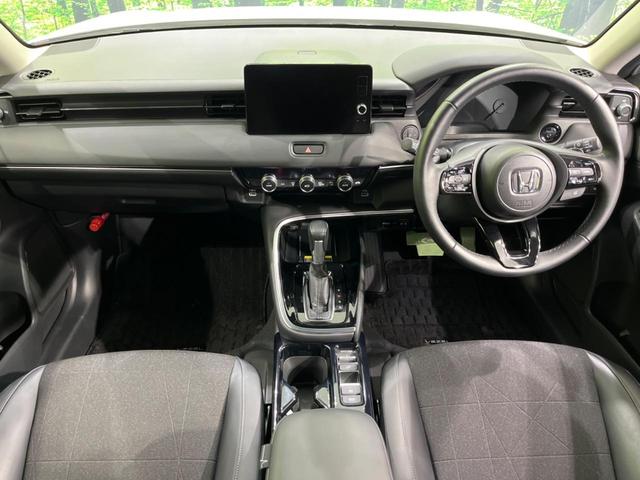 ヴェゼル e:HEV Z 純正9型ナビ バックカメラ 衝突軽減装置 禁煙車 電動リアゲート ハーフレザーシート ドラレコ コーナーセンサー スマートキー LEDヘッド ETC2.0 純正18インチAW オートハイビーム(2枚目)