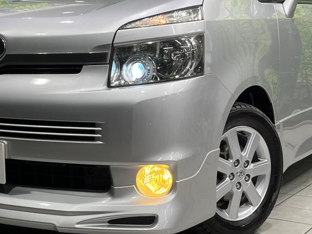 ヴォクシー ＺＳ　４ＷＤ　両側電動ドア　後席モニター　９型ナビ　バックカメラ　禁煙車　ドラレコ　スマートキー　ＨＩＤヘッド　エアロ　ＥＴＣ　純正１６インチＡＷ　オートエアコン　Ｂｌｕｅｔｏｏｔｈ　フルセグ　パドルシフト（13枚目）