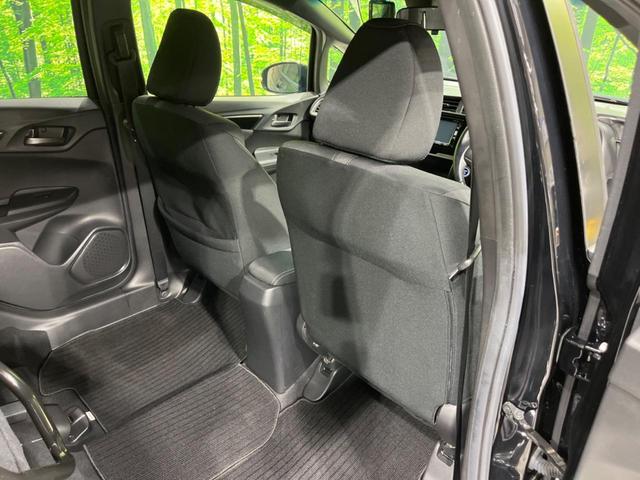 フィットハイブリッド S ホンダセンシング 純正ナビ バックカメラ 衝突軽減装置 アダプティブクルーズ 禁煙車 前後ドラレコ スマートキー LEDヘッド&フォグ ETC オートハイビーム 誤発進抑制機能 車線逸脱警報 オートエアコン 純正AW(64枚目)