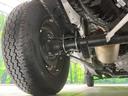 KCエアコン・パワステ 4WD 5MT 衝突軽減装置 禁煙車 クリアランスソナー オートハイビーム 誤発進抑制機能 車線逸脱警報 先行車発進告知 オートライト ヘッドライトレベライザー AM FM再生 3方開荷台(21枚目)