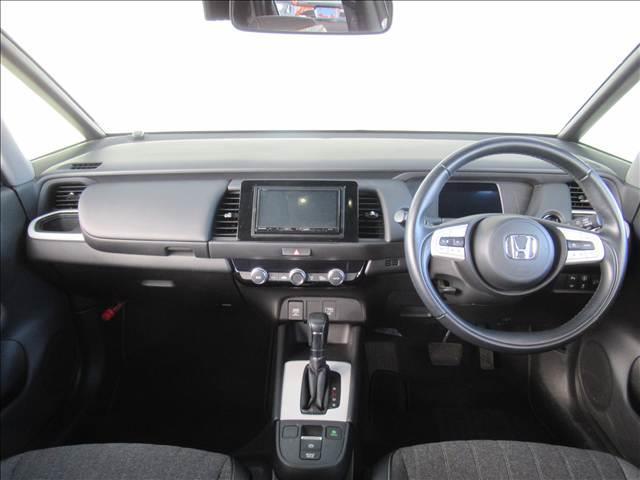 フィット e:HEV HOME 禁煙車 衝突軽減ブレーキ 歩行者事故低減ステアリング 誤発進抑制機能 近距離衝突軽減ブレーキ 渋滞追従機能付アダプティブクルーズコントロール 車線維持支援システム パーキングセンサーシステム(8枚目)