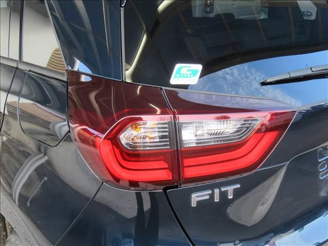 フィット e:HEV HOME 禁煙車 衝突軽減ブレーキ 歩行者事故低減ステアリング 誤発進抑制機能 近距離衝突軽減ブレーキ 渋滞追従機能付アダプティブクルーズコントロール 車線維持支援システム パーキングセンサーシステム(29枚目)