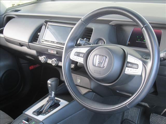 フィット e:HEV HOME 禁煙車 衝突軽減ブレーキ 歩行者事故低減ステアリング 誤発進抑制機能 近距離衝突軽減ブレーキ 渋滞追従機能付アダプティブクルーズコントロール 車線維持支援システム パーキングセンサーシステム(39枚目)