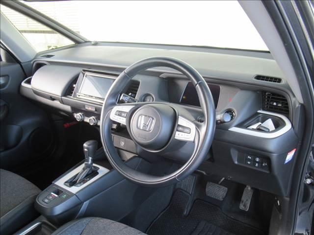 フィット e:HEV HOME 禁煙車 衝突軽減ブレーキ 歩行者事故低減ステアリング 誤発進抑制機能 近距離衝突軽減ブレーキ 渋滞追従機能付アダプティブクルーズコントロール 車線維持支援システム パーキングセンサーシステム(40枚目)