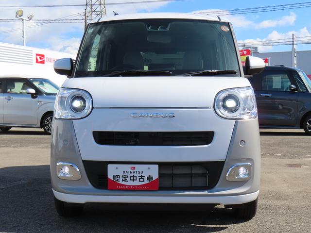 ムーヴキャンバス ストライプスＧ　４ＷＤ　ＣＶＴ　６６０ｃｃ　ナビ　両側電動スライドドア　衝突被害軽減ブレーキ　横滑り防止装置　ＡＢＳ　アイドリングストップ　プッシュボタンスタート　オートエアコン　ベンチシート　ホットカップホルダー（3枚目）