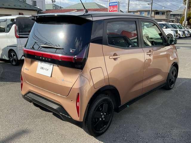 サクラ Ｘ　９０周年記念車　充電ケーブル有　試乗車ＵＰ　プロパイロット　メーカーナビＴＶ　エマージェンシーブレーキ　アラウンドビューモニター　障害物センサー　車線逸脱警報　シートヒーター　ドラレコ　ＥＴＣ　ＬＥＤライト　アルミ　インテリキー（3枚目）