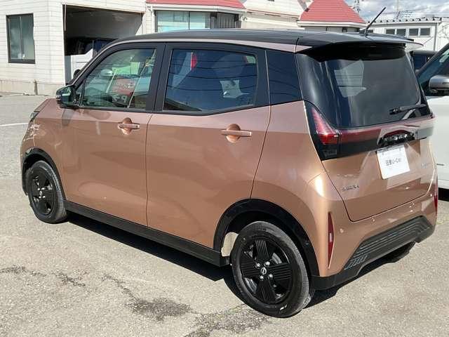 サクラ Ｘ　９０周年記念車　充電ケーブル有　試乗車ＵＰ　プロパイロット　メーカーナビＴＶ　エマージェンシーブレーキ　アラウンドビューモニター　障害物センサー　車線逸脱警報　シートヒーター　ドラレコ　ＥＴＣ　ＬＥＤライト　アルミ　インテリキー（21枚目）