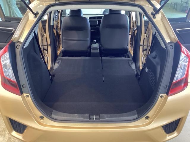 フィットハイブリッド Ｌパッケージ　光触媒抗菌消臭施工済　ナビ　ＥＴＣ　ＥＣＯモード　運転席エアバッグ　両席エアバック　スマートキー　ＬＥＤライト　１セグＴＶ　キーフリ　オートクルーズ付　ＤＶＤ　セキュリティ　横滑防止装置　ＡＢＳ（19枚目）