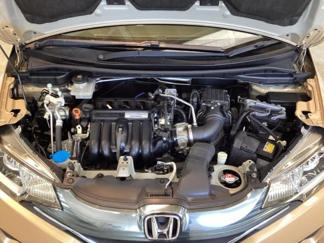 フィットハイブリッド Ｌパッケージ　光触媒抗菌消臭施工済　ナビ　ＥＴＣ　ＥＣＯモード　運転席エアバッグ　両席エアバック　スマートキー　ＬＥＤライト　１セグＴＶ　キーフリ　オートクルーズ付　ＤＶＤ　セキュリティ　横滑防止装置　ＡＢＳ（20枚目）