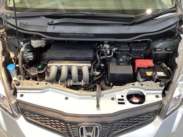 フィット 13G・スマートセレクションファインスタイル 光触媒抗菌消臭施工済 エンジンスターター ナビ ETC 盗難防止装置 DVD キーレス 地デジ オートエアコン バックカメラ パワーウィンドウ ABS 4WD パワーステアリング スマートキー(21枚目)