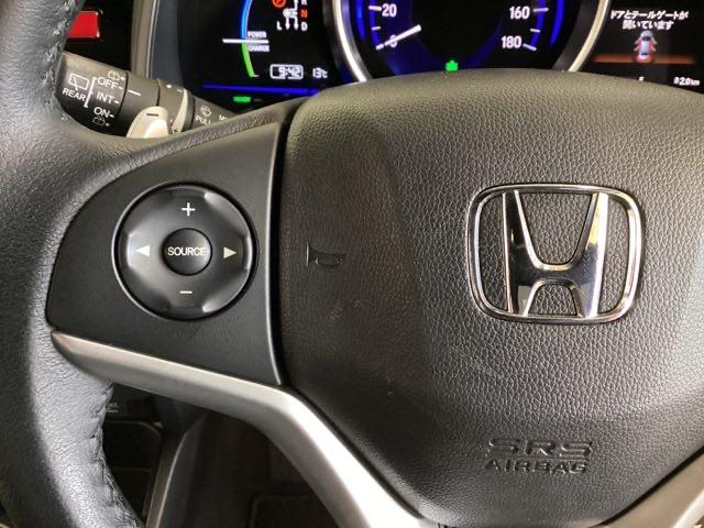 フィットハイブリッド Ｓパッケージ　光触媒抗菌消臭施工済　ＭＴモード　ＥＴＣ　バックモニター　ＡＢＳ　オートクルーズ　地デジ　スマキー　ＡＡＣ　ＬＥＤヘッドランプ　盗難防止装置　キーレスエントリー　アイドリングストップ　４ＷＤ　ＥＳＣ（11枚目）