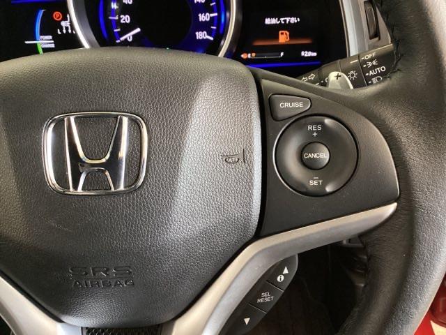 フィットハイブリッド Ｓパッケージ　光触媒抗菌消臭施工済　ＭＴモード　ＥＴＣ　バックモニター　ＡＢＳ　オートクルーズ　地デジ　スマキー　ＡＡＣ　ＬＥＤヘッドランプ　盗難防止装置　キーレスエントリー　アイドリングストップ　４ＷＤ　ＥＳＣ（12枚目）