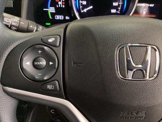 フィットハイブリッド Ｆコンフォートエディション　光触媒抗菌消臭施工済　シートヒーター　ＥＴＣ　Ｂｌｕｅｔｏｏｔｈ　フルセグＴＶ　盗難防止システム　アイドリングストップ　スマートキー　バックカメラ　４ＷＤ　ミュージックプレイヤー接続可（11枚目）