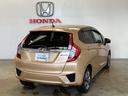 フィットハイブリッド Ｌパッケージ　光触媒抗菌消臭施工済　ナビ　ＥＴＣ　ＥＣＯモード　運転席エアバッグ　両席エアバック　スマートキー　ＬＥＤライト　１セグＴＶ　キーフリ　オートクルーズ付　ＤＶＤ　セキュリティ　横滑防止装置　ＡＢＳ（2枚目）
