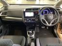 フィットハイブリッド Ｌパッケージ　光触媒抗菌消臭施工済　ナビ　ＥＴＣ　ＥＣＯモード　運転席エアバッグ　両席エアバック　スマートキー　ＬＥＤライト　１セグＴＶ　キーフリ　オートクルーズ付　ＤＶＤ　セキュリティ　横滑防止装置　ＡＢＳ（4枚目）