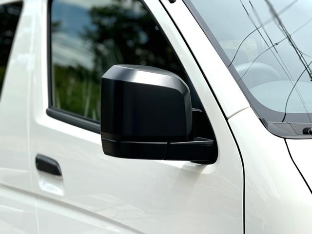 ハイエースバン ロングＤＸ　登録済未使用　９人乗　４ＷＤ　助手席エアバック　リヤヒーター　リアクーラー　プライバシーガラス　クローザー　バックカメラインナーミラー　トヨタセーフティーセンス　クリアランスソナー　ＡＣ１００Ｖ電源（48枚目）