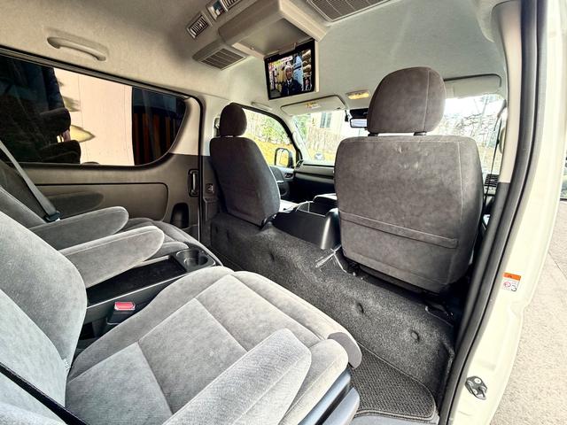 ハイエースワゴン GLファインテックツアラー 特装車 禁煙車 寒冷地仕様 純正15インチアルミ LEDヘッドライト+LEDフォグ 両側パワースライド 前後カメラドラレコ デジタルインナーミラー 純正リモスタ 7インチメモリーナビ 12インチフリップダウン(23枚目)