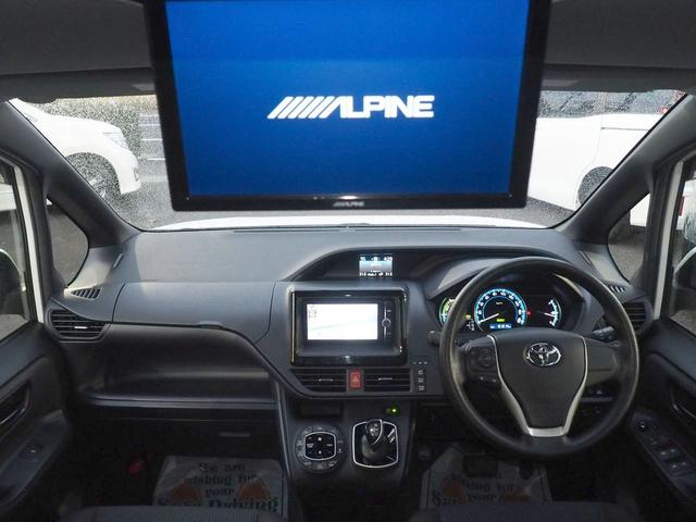 ヴォクシー ハイブリッドＸ　ＳＤナビ　ＡＬＰＩＮＥモニター　電動ドア　スマートキー　７人　ＬＥＤライト　純正１５インチアルミ　地デジＴＶ　Ｂｌｕｅｔｏｏｔｈ　ＤＶＤ　ＣＤ録音　ＳＤ　ＥＴＣ　バックカメラ　フロントコーナーセンサー　横滑り防止　ＴＲＣ　関東１オーナー　禁煙（10枚目）