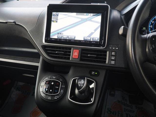 ヴォクシー ハイブリッドV 純正8型画面ナビ 後席モニター 両側電動ドア スマートキー 7人乗り LEDライト 革巻ハンドル 地デジTV Bluetooth DVD CD録音 SD ETC バックカメラ クルコン 横滑り防止 リアヒーター シートヒーター 純正エンスタ 禁煙(15枚目)