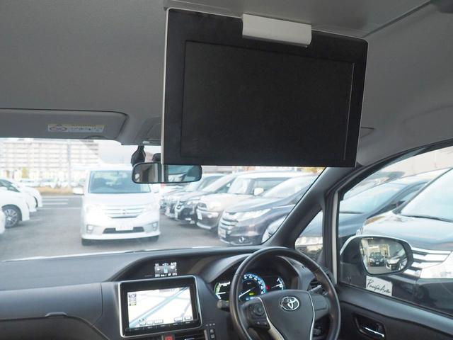 ヴォクシー ハイブリッドV 純正8型画面ナビ 後席モニター 両側電動ドア スマートキー 7人乗り LEDライト 革巻ハンドル 地デジTV Bluetooth DVD CD録音 SD ETC バックカメラ クルコン 横滑り防止 リアヒーター シートヒーター 純正エンスタ 禁煙(19枚目)