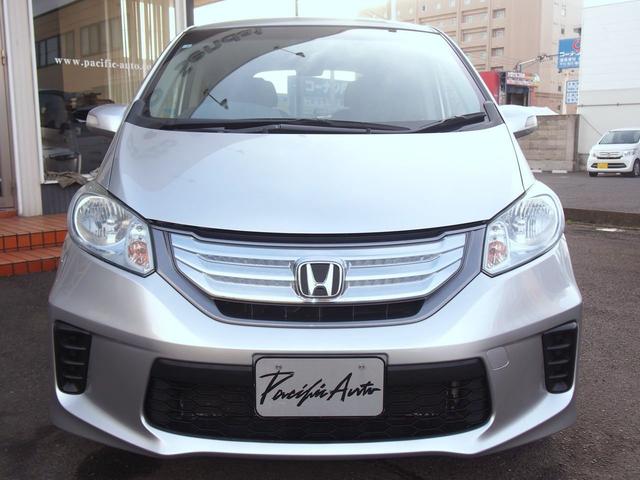 フリードハイブリッド ジャストセレクション　ＨＤＤナビ　後席モニター　バックカメラ　電動ドア　６人乗り　スマートキー　２列目キャプテンシート　右側オートクロージャードア　純正エアロ　ＨＩＤライト　ウィンカードアミラー　１セグＴＶ　ＤＶＤ　ＣＤ録音　クルコン　横滑り防止　ＥＴＣ　禁煙車（2枚目）