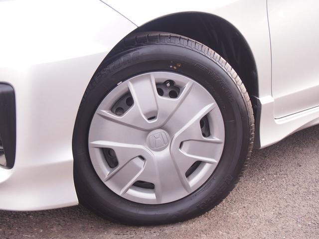 フリードハイブリッド ジャストセレクション　ＨＤＤナビ　後席モニター　バックカメラ　電動ドア　６人乗り　スマートキー　２列目キャプテンシート　右側オートクロージャードア　純正エアロ　ＨＩＤライト　ウィンカードアミラー　１セグＴＶ　ＤＶＤ　ＣＤ録音　クルコン　横滑り防止　ＥＴＣ　禁煙車（25枚目）