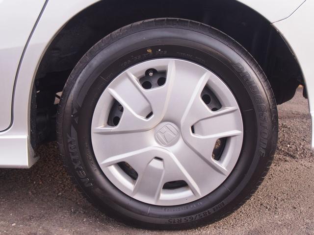 フリードハイブリッド ジャストセレクション　ＨＤＤナビ　後席モニター　バックカメラ　電動ドア　６人乗り　スマートキー　２列目キャプテンシート　右側オートクロージャードア　純正エアロ　ＨＩＤライト　ウィンカードアミラー　１セグＴＶ　ＤＶＤ　ＣＤ録音　クルコン　横滑り防止　ＥＴＣ　禁煙車（27枚目）